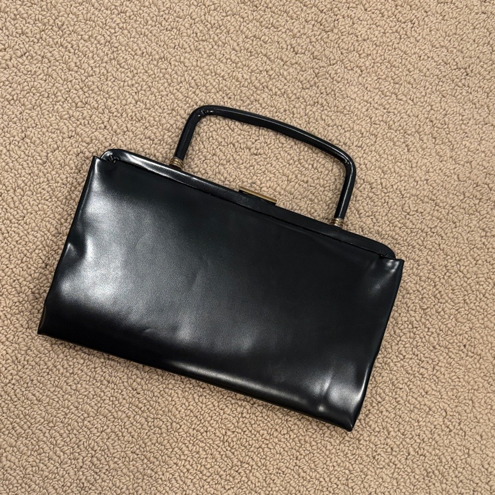 Vintage GARAY Black Evening Bag
Unique Metal Handle